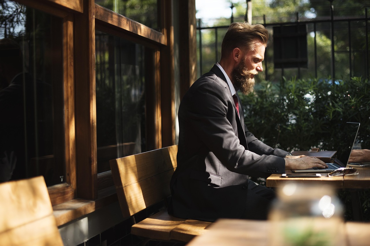 Small business owner working at a laptop