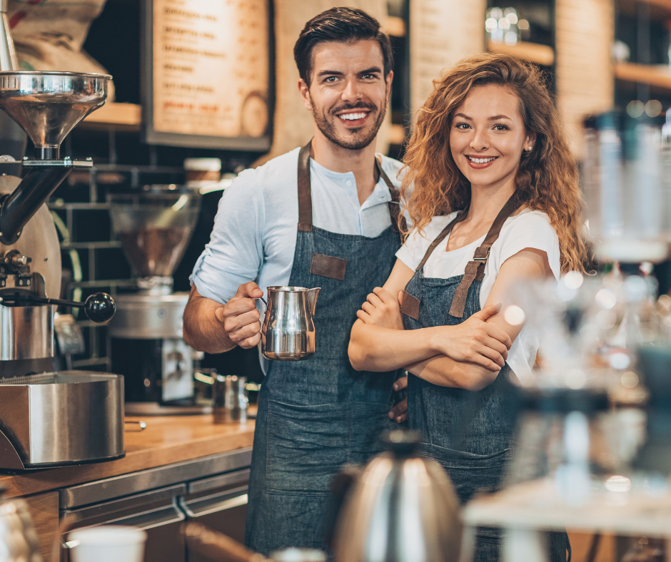 Coffee shop owners behind their counter